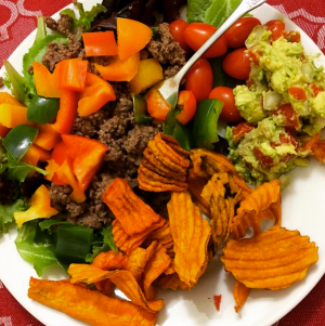 Taco Salad Whole30 is amaze: carrot chips, guac, peppers, grass-fed ground beef and lettuce and tomato!